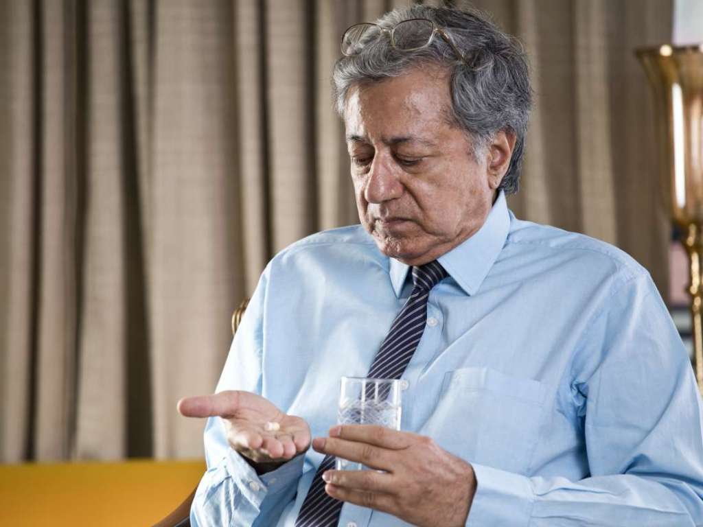 a man taking osteoporosis drug
